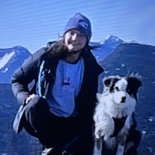 girl hiking with dog